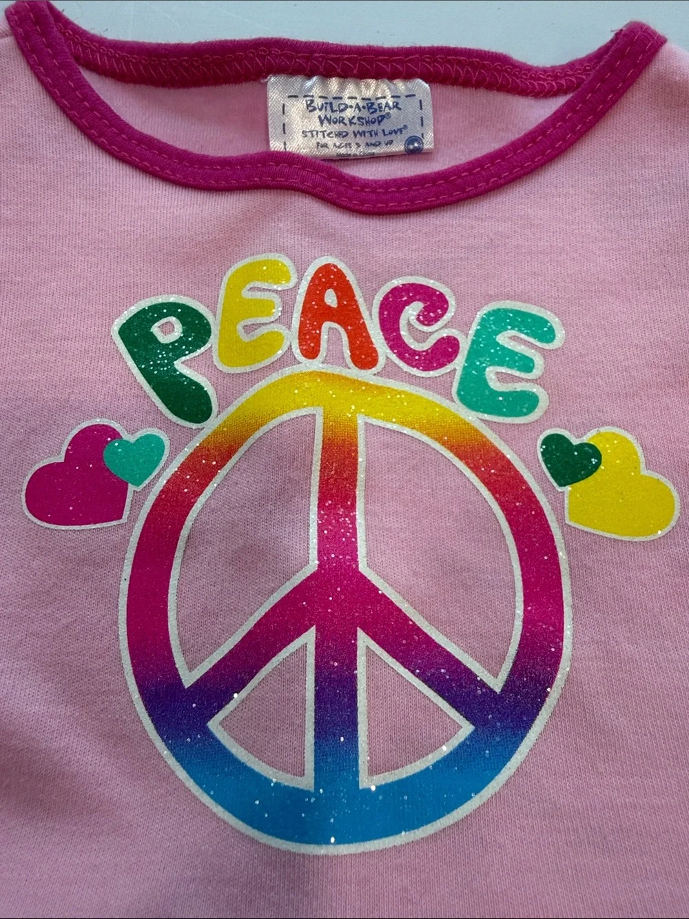 Build-a-bear pink peace sign shirt